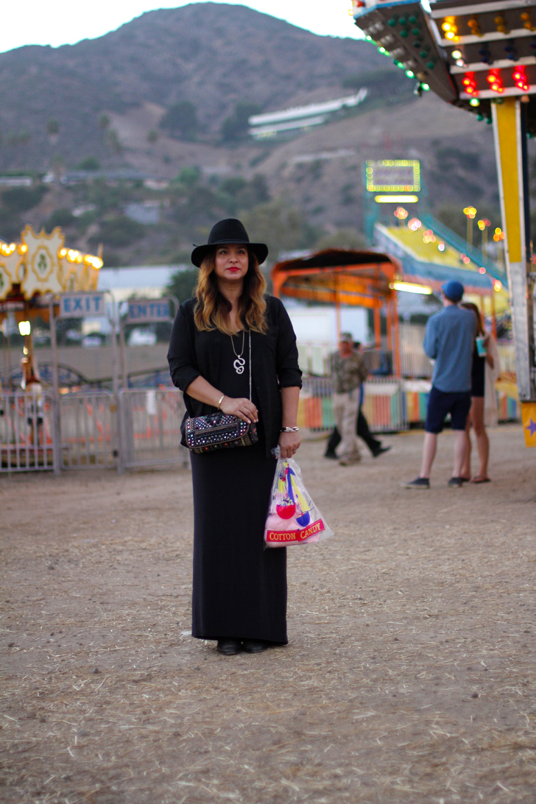 Rossana Vanoni - Malibu Fair outfit Urban Outfitters Leila dress & Ecote mirror clutch, Nordstrom Brixton fedora, Revolve Clothing Dolce Vita Haelyn booties, Topshop Revo sunglasses